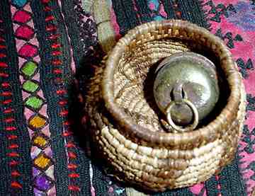 Coiled basket of pine needles and raffia, by Nancy Latham