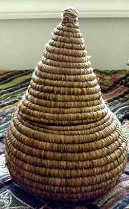 Coiled basket of pine needles and raffia, by Nancy Latham