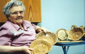 Glady White and her sample baskets