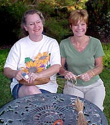 Lisa McCament and Shelly Weis coiling together
